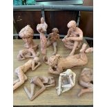 Eleven terracotta sculptures of females, by Fiona Goldbacher