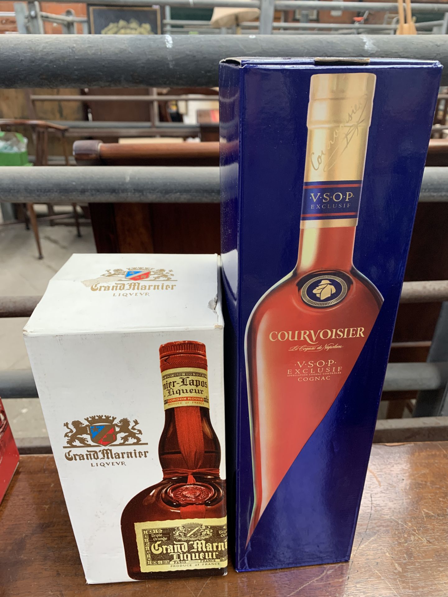 1 litre bottle of Courvoisier VSOP Cognac and 70cl Grand Marnier