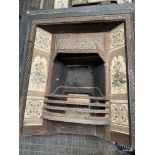 Cast iron Victorian fireplace with tile surround. This item carries VAT.