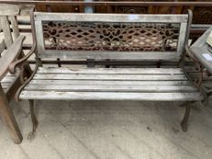 Cast and wrought iron wooden slatted garden bench