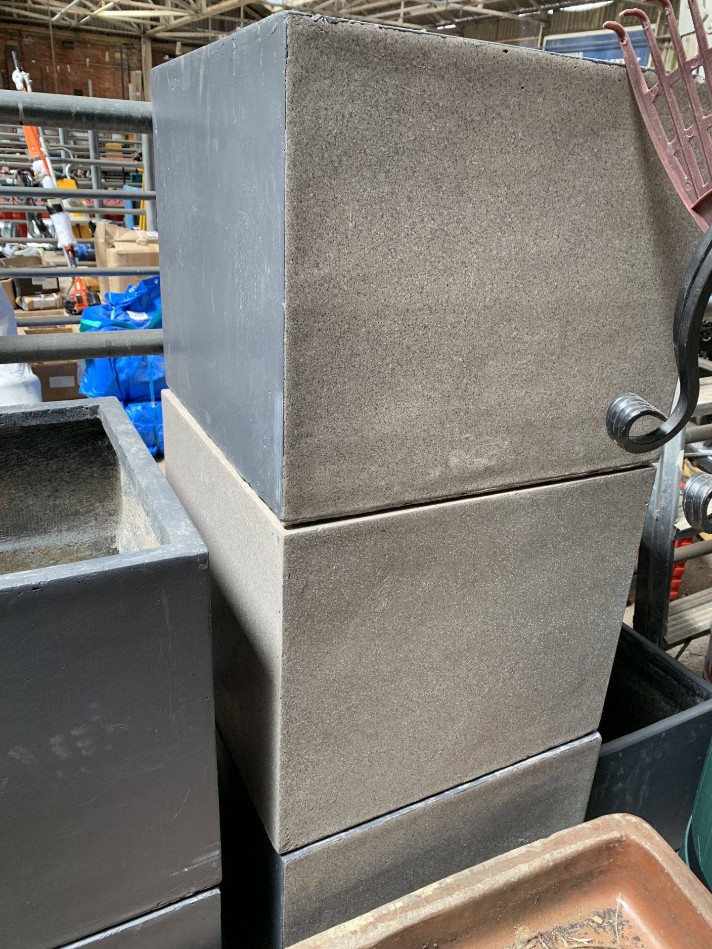 Five square stone-effect fibreglass planters