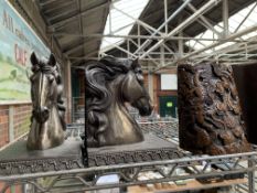 Three pairs of bookends and a model ship