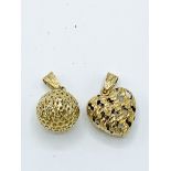 Two 9ct heart and ball shaped pendants