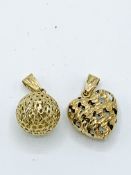 Two 9ct heart and ball shaped pendants