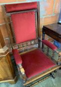 A mahogany open framed American rocking armchair