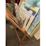 Wooden stand containing a quantity of unframed watercolours of various subjects, Fiona Goldbacher