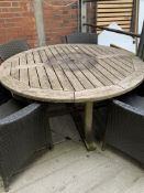 Wooden circular table with 4 rattan chairs. This item carries VAT