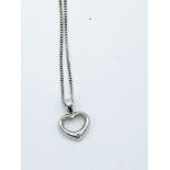 9ct white gold open heart pendant on a 9ct white gold chain