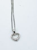 9ct white gold open heart pendant on a 9ct white gold chain