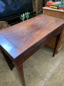 Mahogany fold over swivel top card table