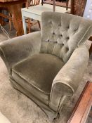 A small button back armchair