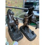 Pair of spelter Marley horses and a metal figure of a stallion