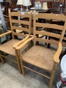 Pair of string seat ladder-back armchairs