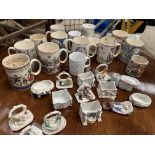 Collection of commemorative mugs and fairings