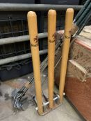 Set of spring mounted cricket stumps and nine Browning golf clubs