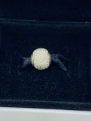 A boxed Pandora silver bracelet bead; together with 24 other Pandora style beads marked 925
