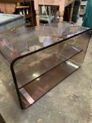 Perspex table with centre shelf and chrome feet