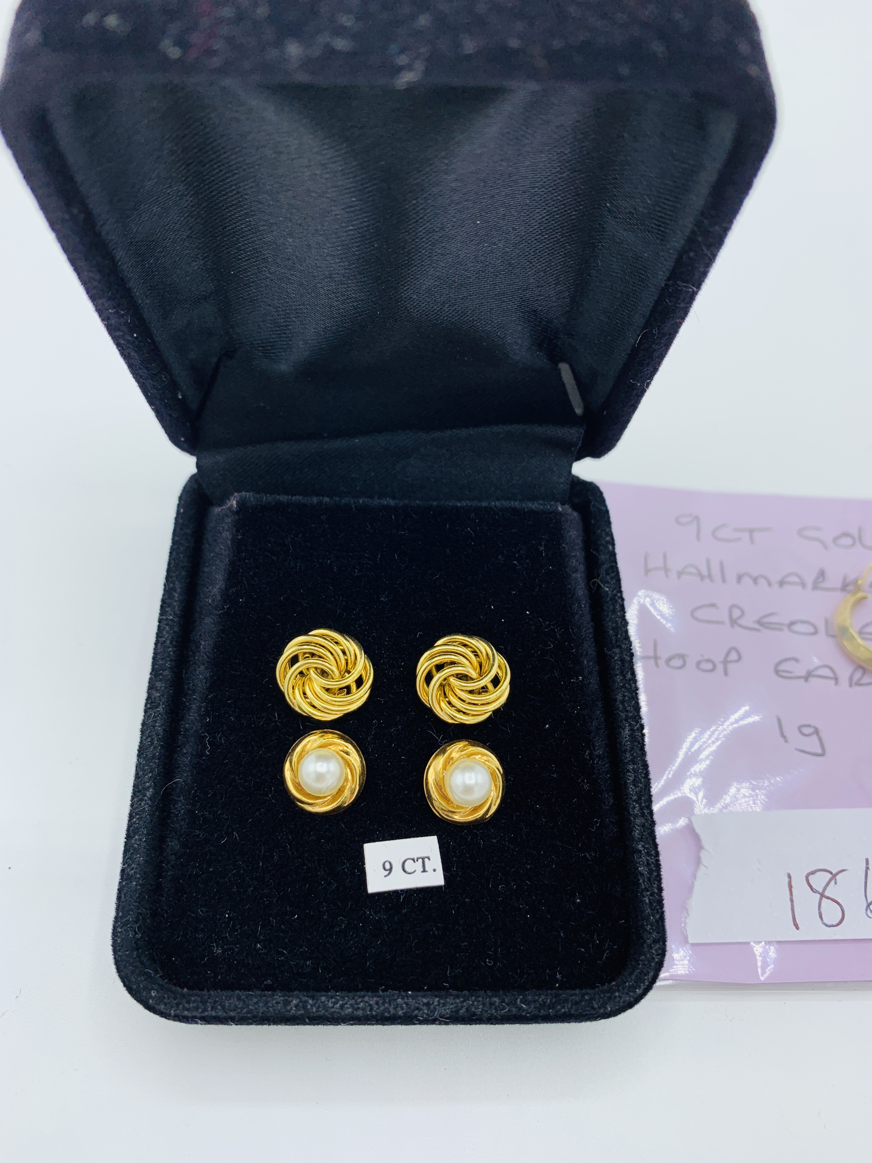 Three pairs of 9ct gold earrings