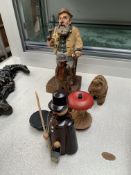 Collection of five hand carved Black Forest style wooden figures and other items