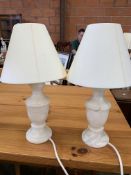 A pair of white onyx table lamps