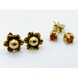 Two pairs of 9ct gold stud earrings