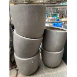 Five round stone-effect fibreglass planters