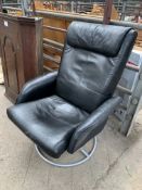 Black leather effect reclinable swivel chair