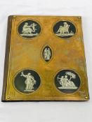 Brass fronted blotter with porcelain cameo inserts