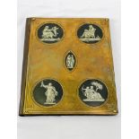 Brass fronted blotter with porcelain cameo inserts