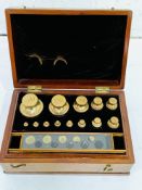 Boxed set of brass standard troy weights, County of Wilts, De Grave & Co