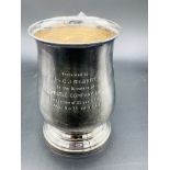 Silver tankard hallmarked Sheffield 1960; together with a silver trophy on Bakelite stand