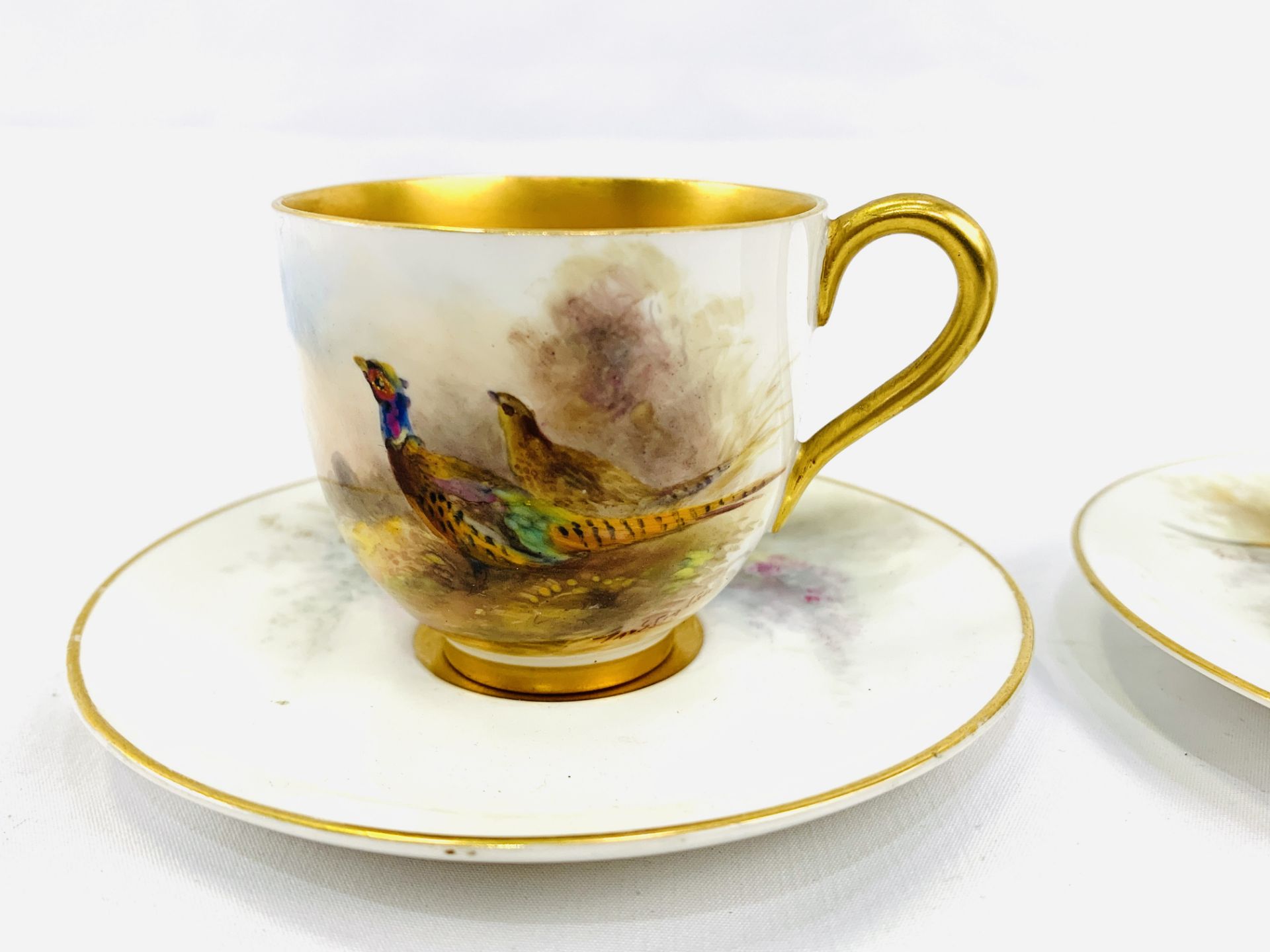 Two Royal Worcester hand painted pheasant cups and saucers by Jas Stinton - Image 2 of 4