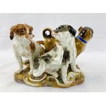 An early 19th-Century Meissen porcelain figure of a group of three dogs