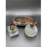 Silver and tortoiseshell manicure box, square glass inkwell and cut glass scent bottle