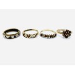 Four 9ct gold rings