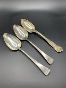 Two Georgian silver tablespoons and a Gorham silver tablespoon
