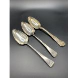 Two Georgian silver tablespoons and a Gorham silver tablespoon