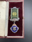 Collection of coins and Grand Lodge of England medal inscribed Minister Lodge