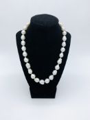 Necklace of 31 natural sea pearls with 18ct gold ball clasp