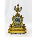 Gilt bronze mantel clock with blue porcelain panels, the movement marked Hy. Marc