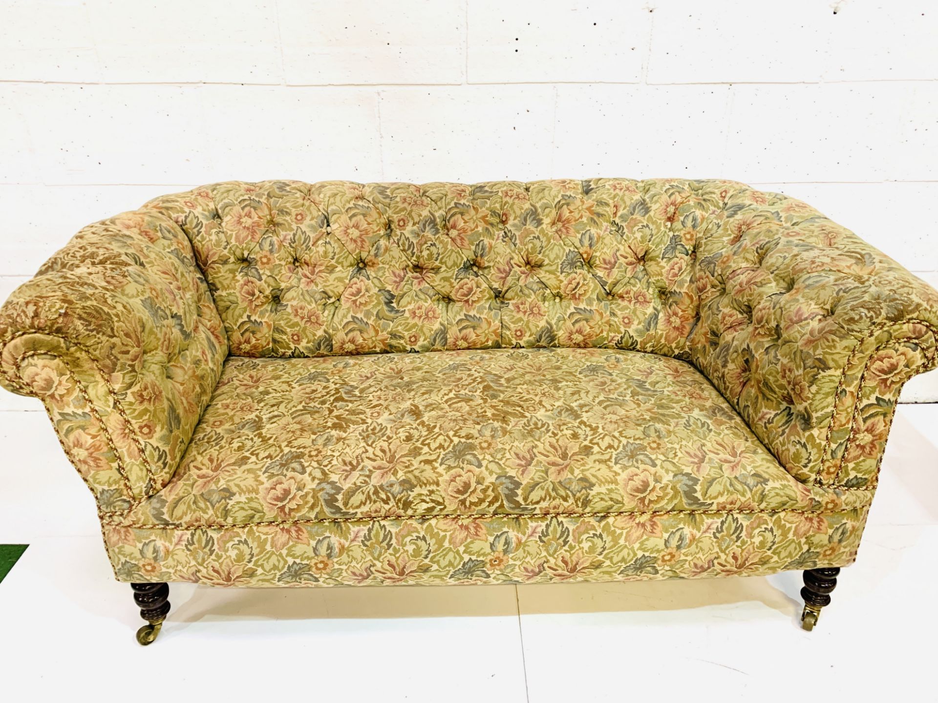 Floral upholstered button back Chesterfield sofa