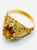 18ct gold and citrine ring and a yellow metal and yellow stone ring