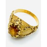 18ct gold and citrine ring and a yellow metal and yellow stone ring