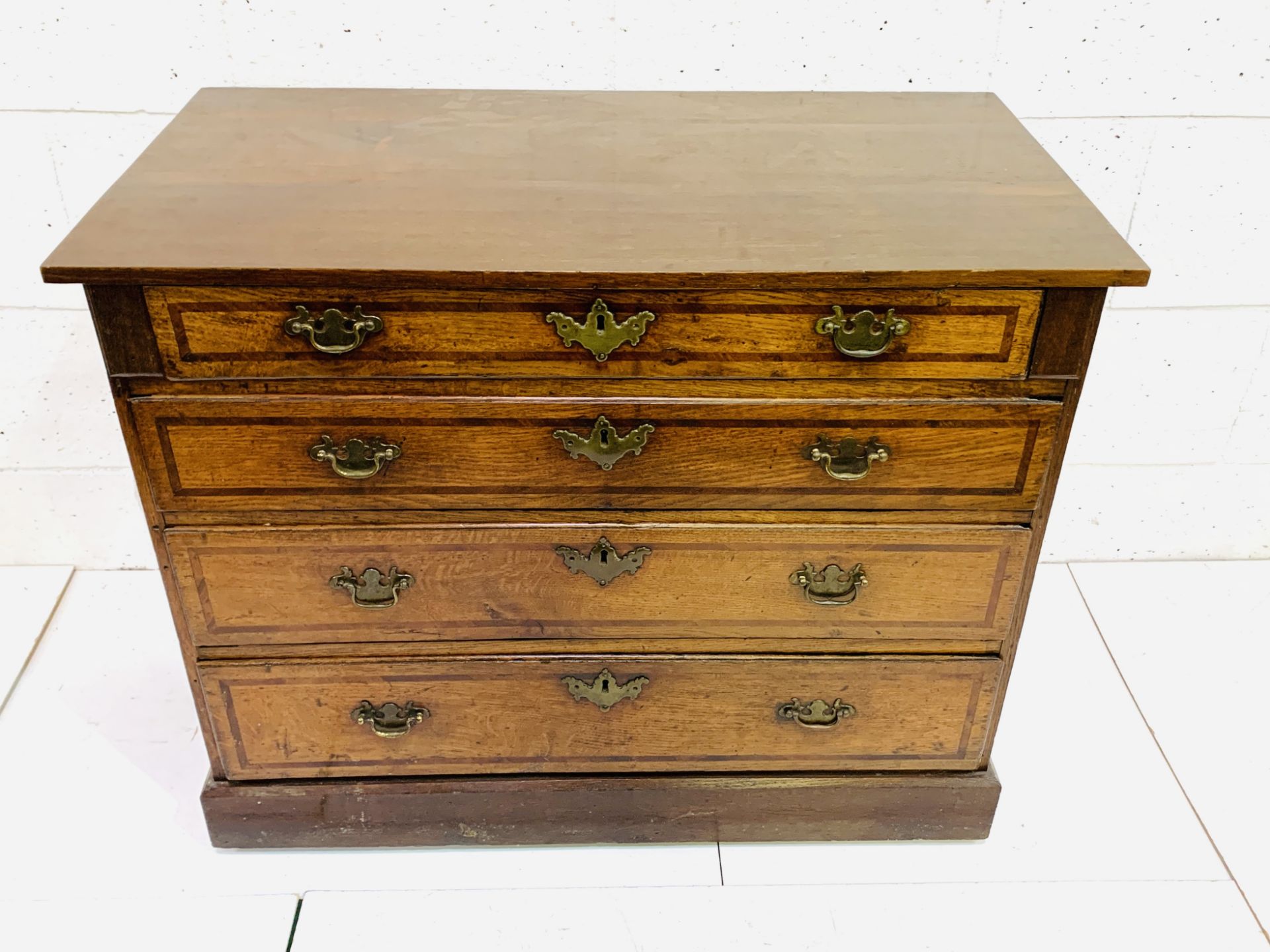 Mahogany chest of four graduated drawers