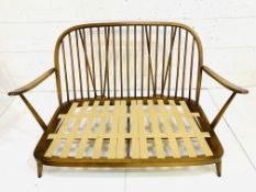 Ercol two seat rail back sofa