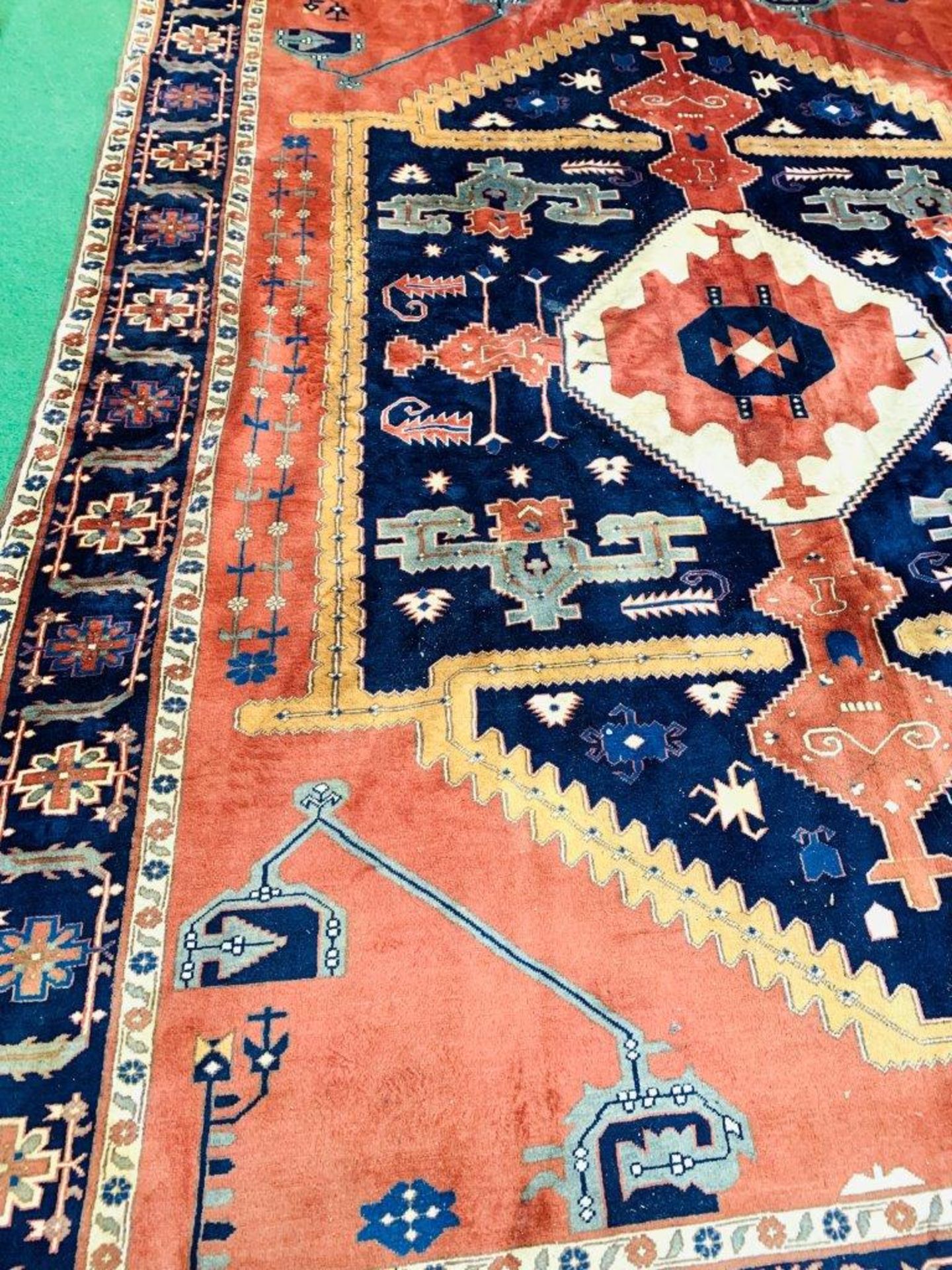 Hand knotted blue and red ground rug - Image 2 of 4