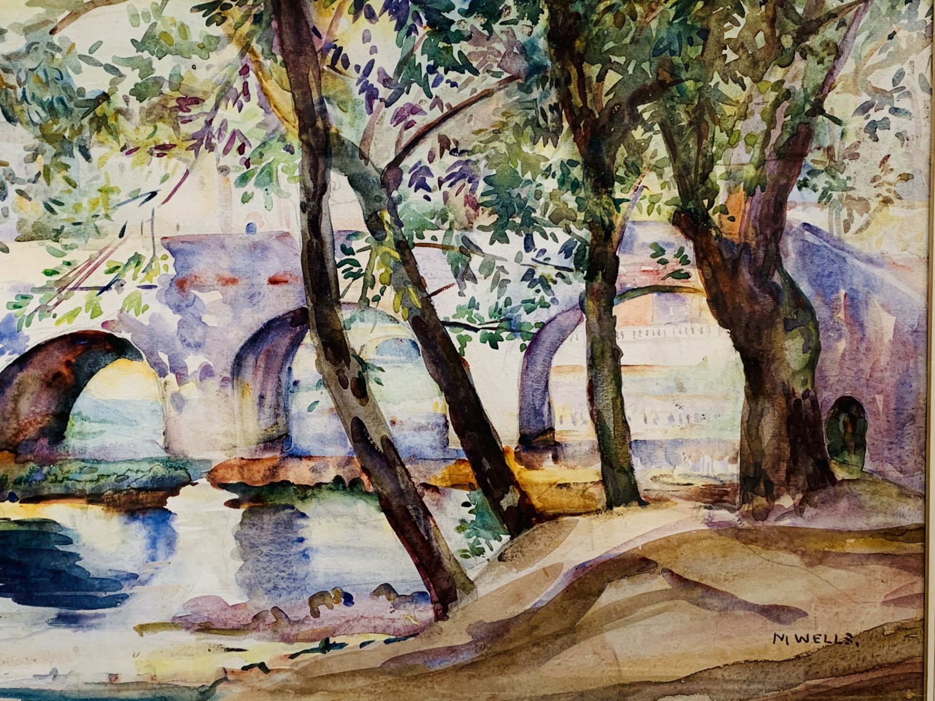 Framed and glazed watercolour of trees by a river and a bridge, signed M. Wells - Image 2 of 3