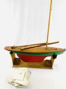 Model single masted pond yacht on stand