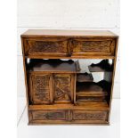 A carved hardwood Japanese cabinet