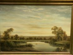 Gilt framed oil on canvas of a river and landscape, written on reverse "On the River Kennett"